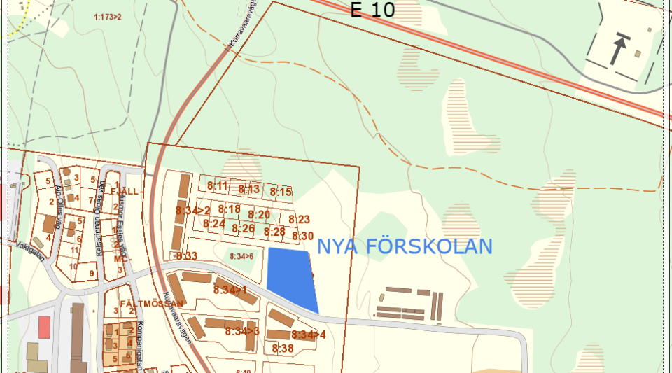 Illustrationen visar en karta med gator och områden i olika färger.